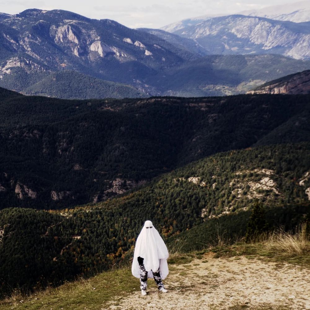 Ghost standing in a montain