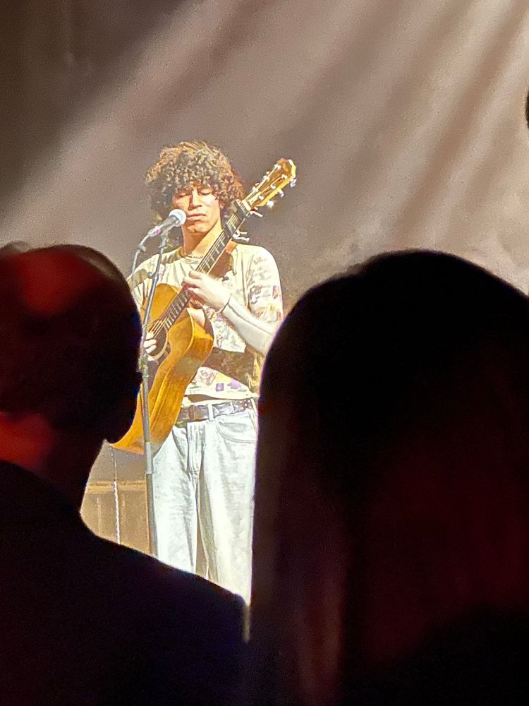 Musician Jacob Alon performs on stage