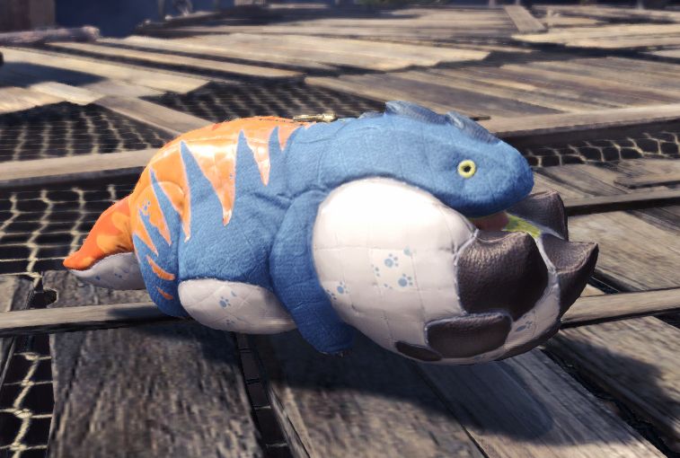 a screenshot of monster hunter world of the poogie. it is dressed in a dodogama costume.