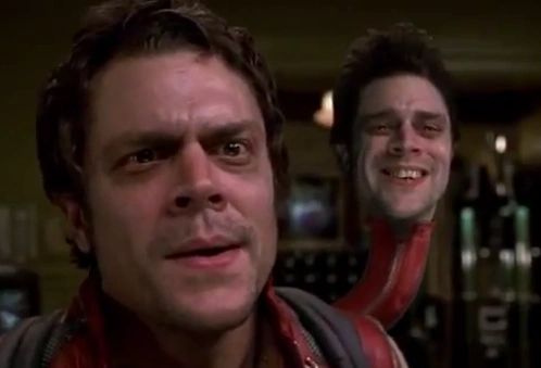Johnny Knoxville from MIB II A man with a smaller version of his own head coming out of his backpack.