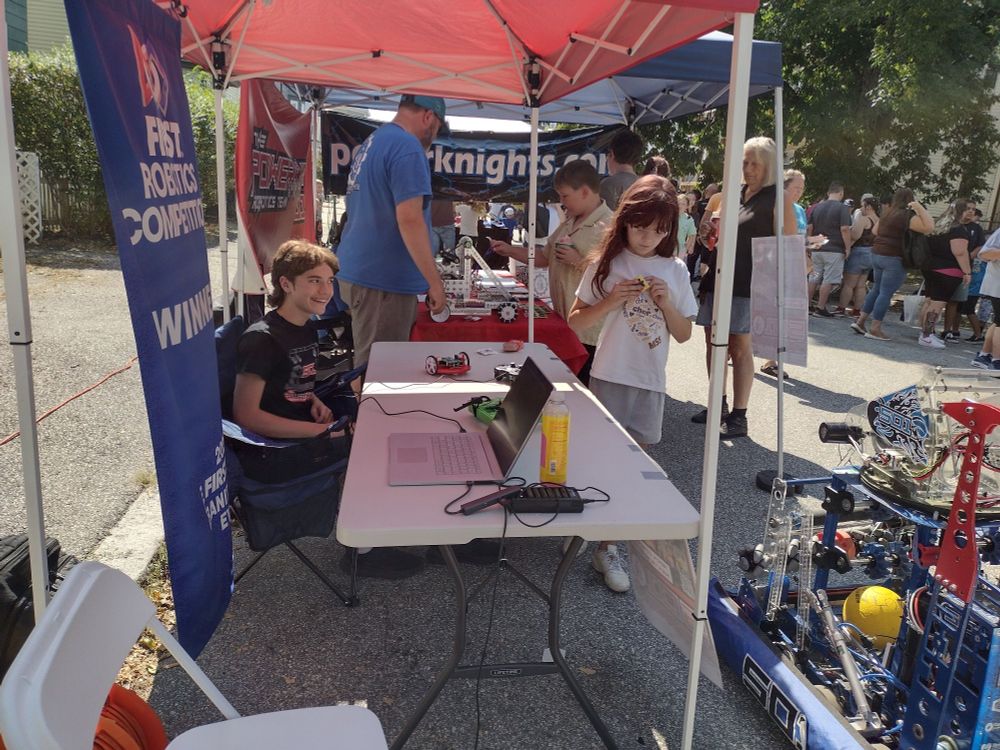 Neighborhood block party (robotics demonstration on street)
