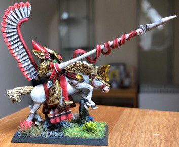 I have tried to replicate the saddle cloth with green stuff. The lance is a dark elf lance instead….the back banner is made in the same method as Mike, and eagle wing glued to metal wire. 
Huge amount of work overall took me a month solid during COVID but the end result is my best ever miniature by a mile!