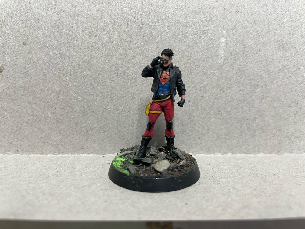 Superboy miniature. The 90’s Superboy with the leather jacket. That one.