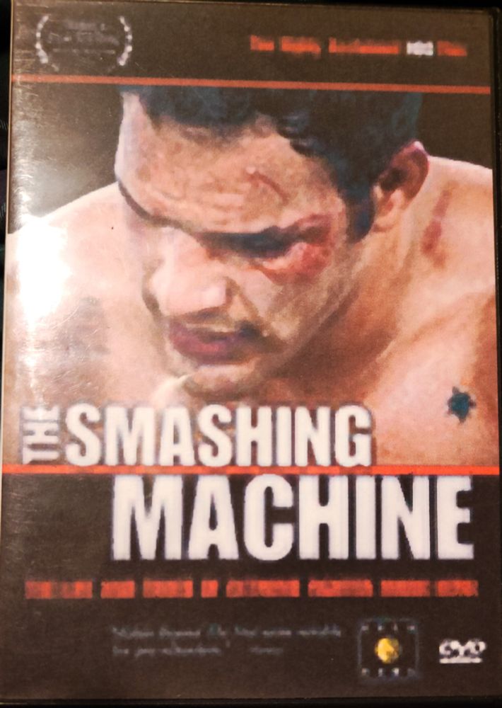 The cover for the Smashing Machine DVD featuring a close up of Mark Kerr head and shoulders.