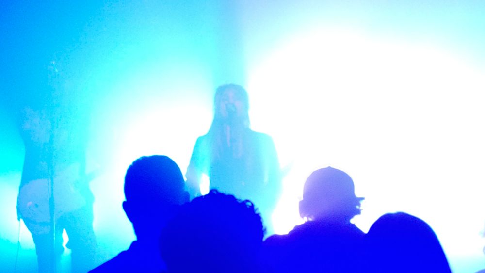 Slow Crush live on stage. Combination of dry ice and backlight, make it look abstract and like blue blobs of various hues.