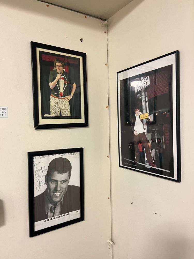 Backstage framed photos at the Frog and Bucket of Johnny Vegas, Steve Coogan and John Bishop