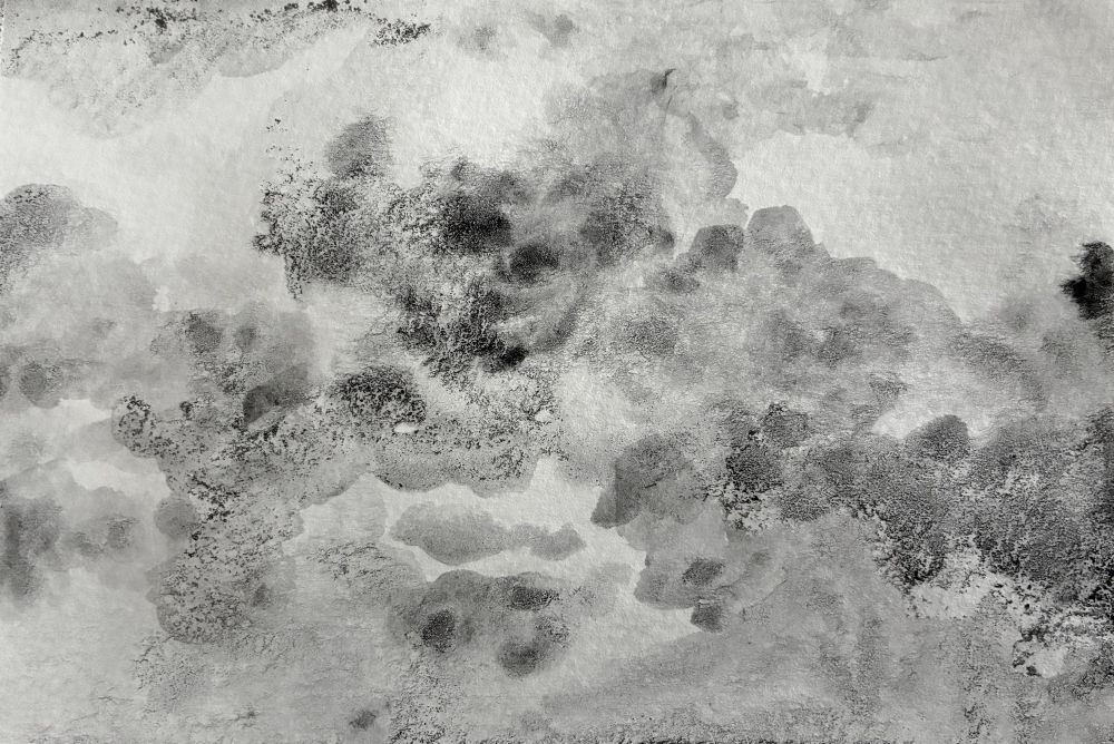 Ink splashes on white paper. 