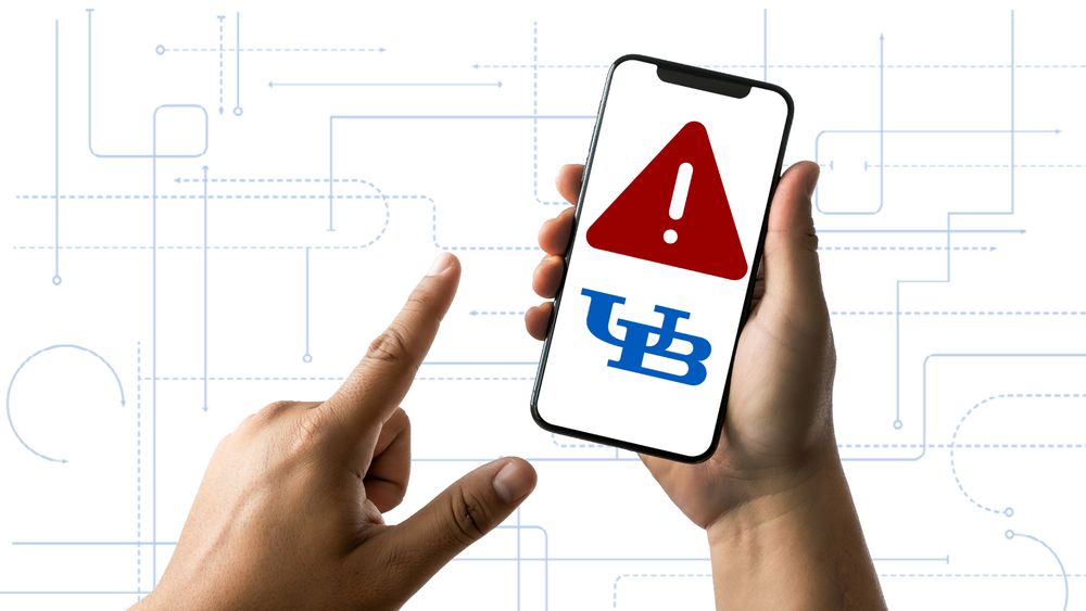 A UB phishing scam alert on a smartphone screen