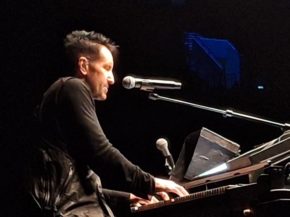 Trent Reznor playing piano.