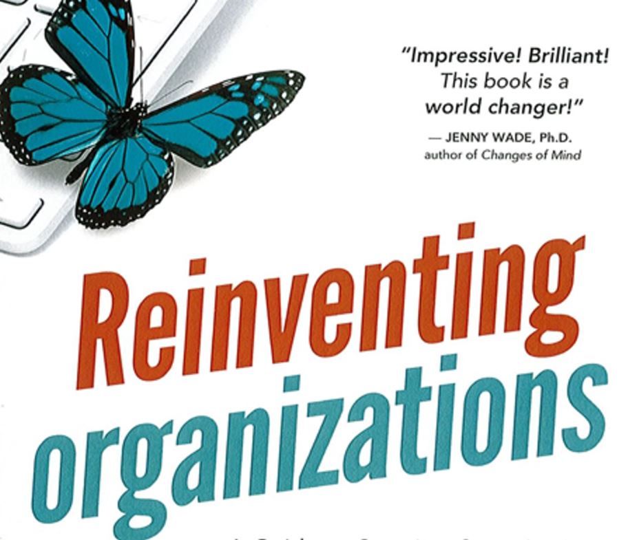 Cover image of the book Reinventing Organizations
It has a quote "Impressive! Brilliant! This book is a world changer" - Jenny Wade, Ph.D author Changes of Mind
The book has a blue butterfly on a keyboard

The book charts the evolution of organisations from fragile top down command and control structures to more organic emppwerment and collaborative structures