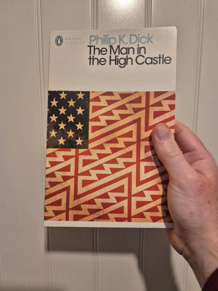 A version of the US flag, but the stripes are in zig zaggy lines across 