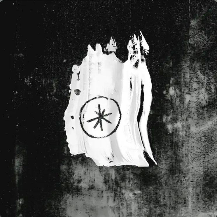 A black background with a white block with a circle and start in the middle 