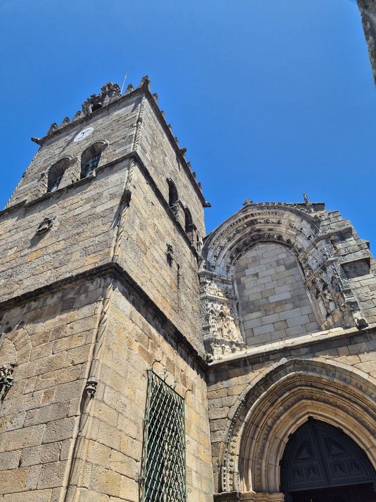 A church with an ornate doorway on the right