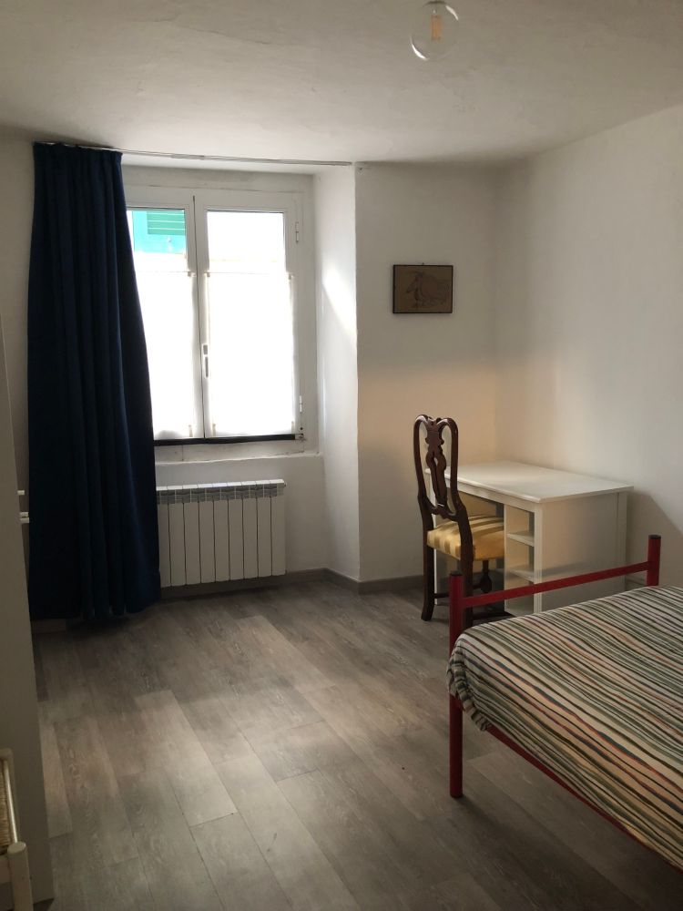 Exemple de chambre d'hébergement dans un bien confisqué