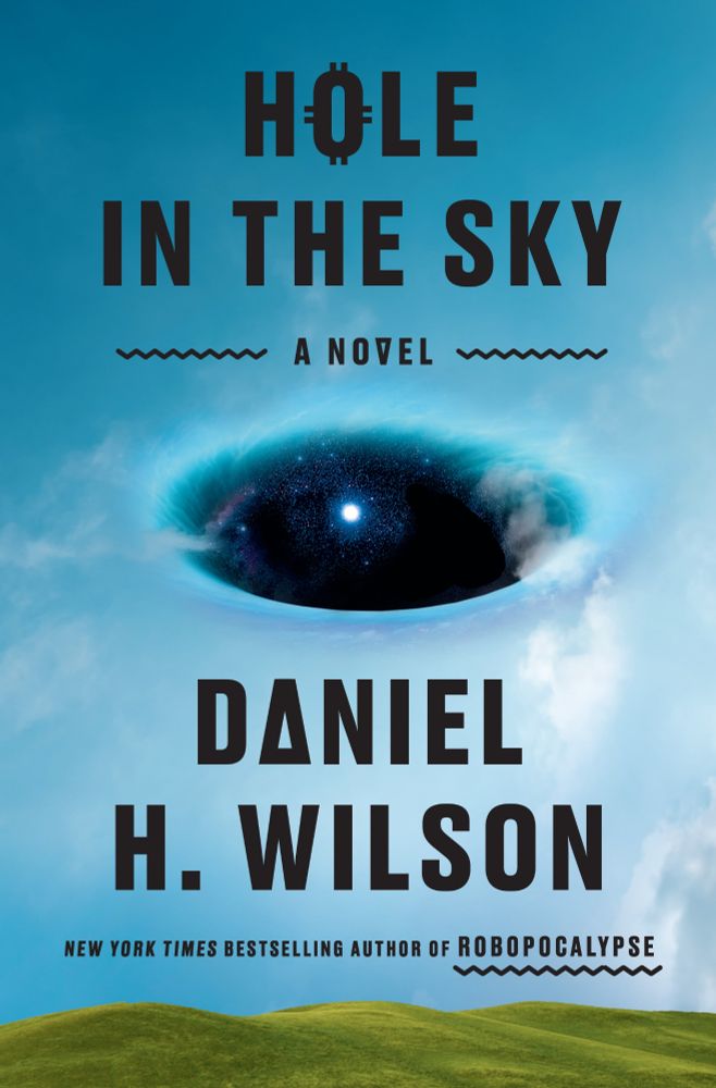 The cover of Daniel H. Wilson's novel "Hole in the Sky" shows green hills underneath a partially cloudy blue sky with a dark oval void at the center containing stars, with one particularly bright star giving the impression it is the pupil of an eye. 