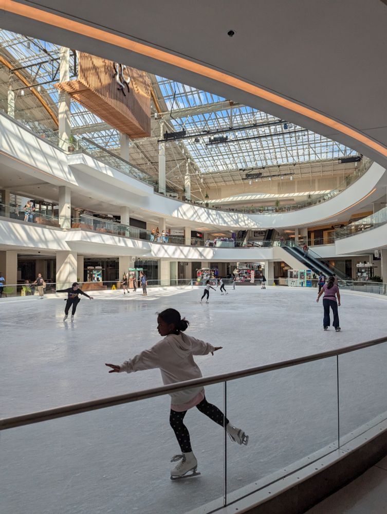 Ice skating rink in a mall.