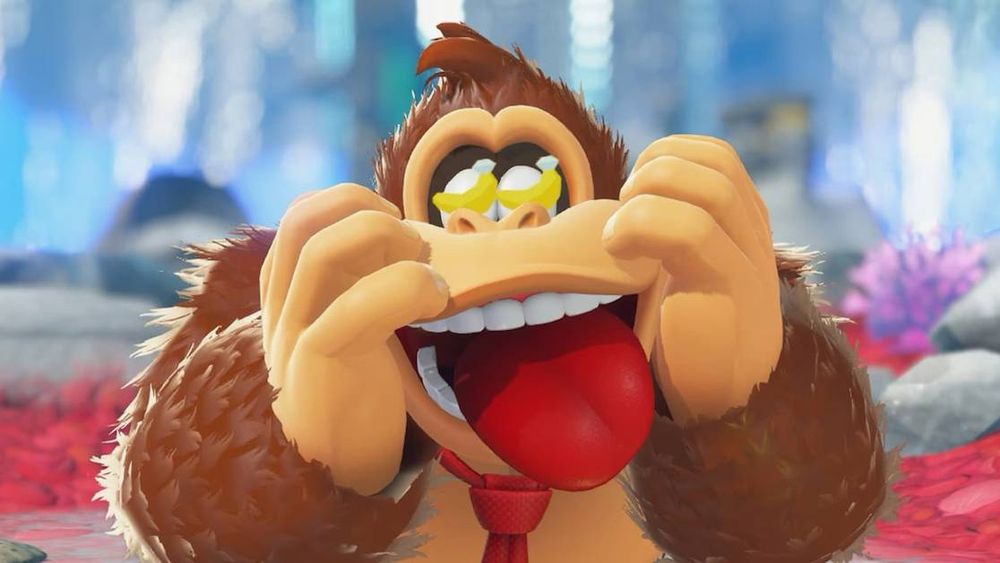 Donkey Kong holding his face on both sides, with his tongue sticking out and a banana instead of pupils in each eye.