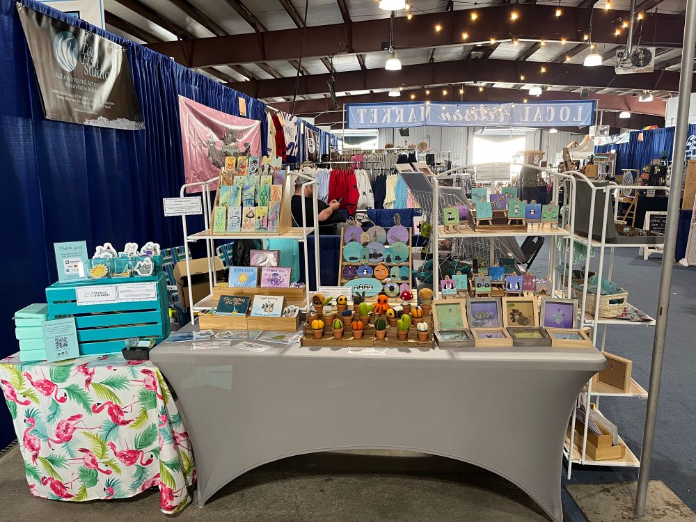 The side view - hand painted bookmarks, beach glass ornaments, needle felting pots with animals & plants, beach glass mini painting and shadow boxes, and cute character stickers