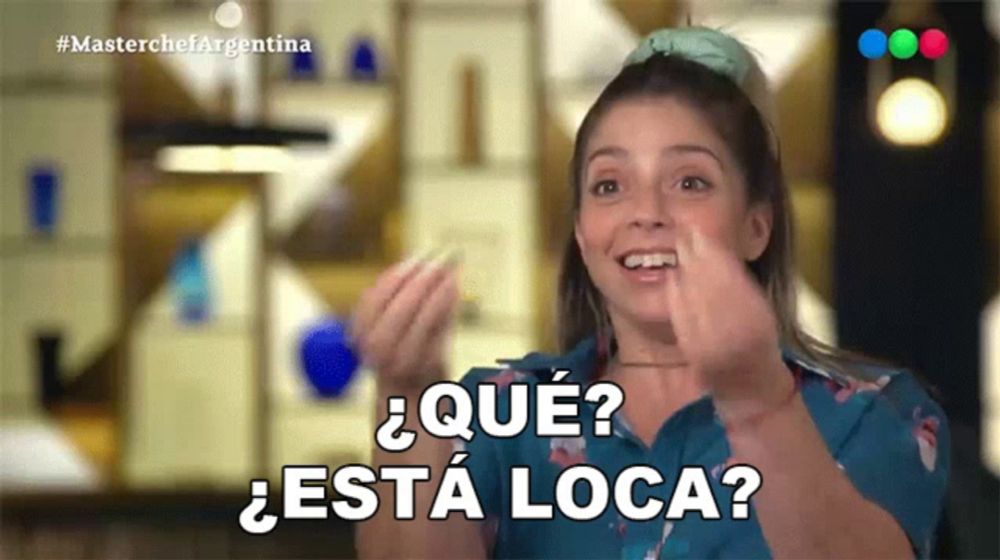 a woman in a blue shirt says " que esta loca " in spanish