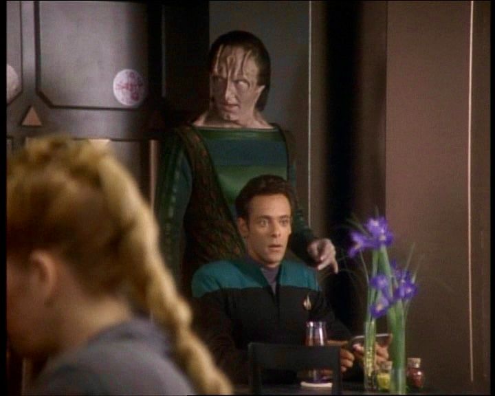 Elim Garak stands behind Julian Bashir while on Deep Space Nine. Garak is behaving as though he is ravenously selecting live prey and Julian looks like he knows he’s fucked. Or gonna be. 