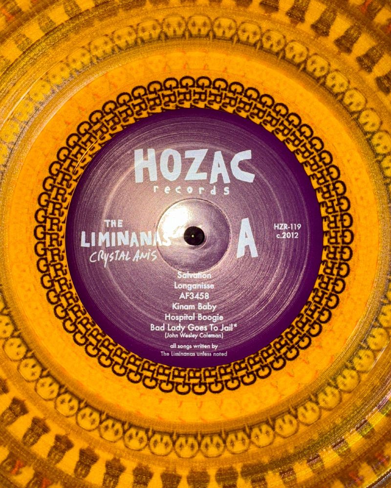 Center label of the Limiñanas album "Crystal Anis" on certified HoZac Gold vinyl with a zoetrope slipmat showing beneath.