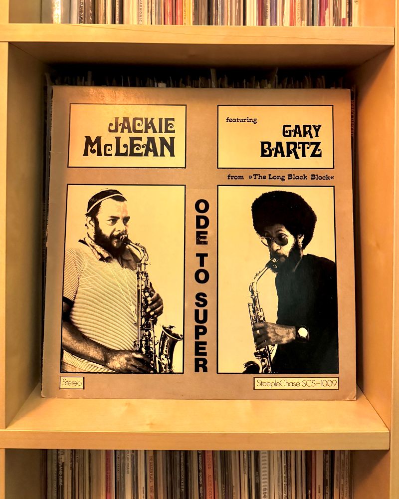 Vinyl sleeve of Jackie McLean featuring Gary Bart’s album “Ode to Super” nestled in the cubby of a vinyl record shelf.


#nowplaying
#jazzsky