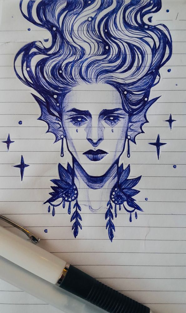 A ballpoint pen doodle drawn on note paper
