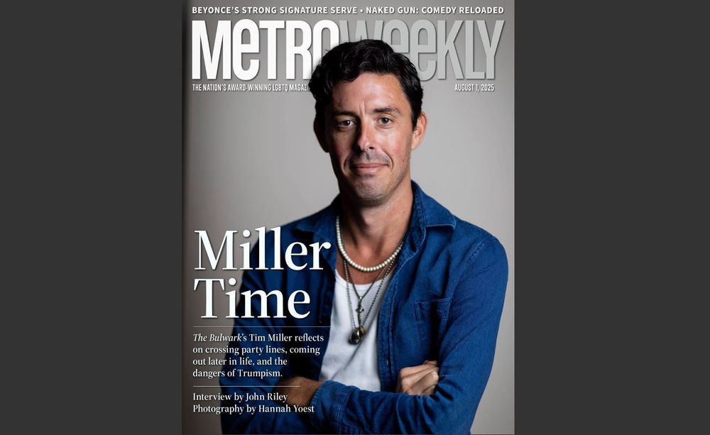 Cover of the August 1, 2025 issue of Metro Weekly, with Tim Miller on the cover. The headline: "Miller Time." He's photographed in a blue shirt, white undershirt, and several necklaces, including his trademark pearls.