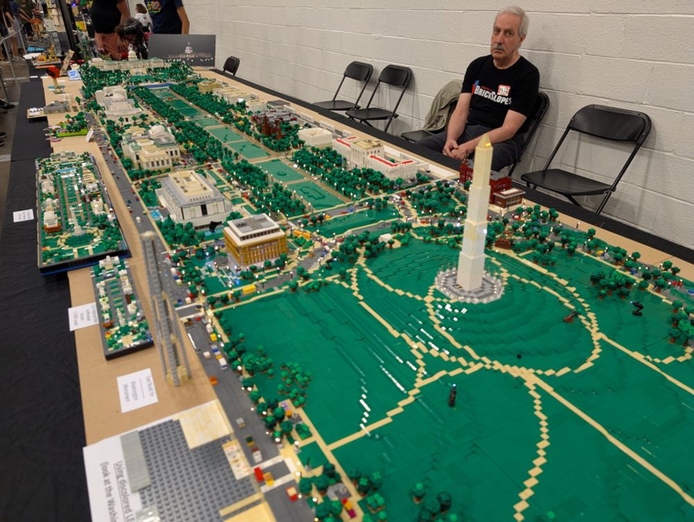 A huge model of the National Mall in Washington, D.C., with the Capitol visible in the distance (upper left) and the  Washington Monument in the foreground. Wayne R. Tyler of Salt Lake City, Utah built this (imagine driving this huge thing all the way from Salt Lake City to D.C.!). Some of these buildings light up. But the coolest thing here is that the design makes use of something that many people consider a flaw in Lego. Certain colors of Lego elements lose their color over time. White pieces in particular tend to yellow. So the builders intentionally used different shades of aging white bricks to make the buildings look more realistic. Check out the Washington Monument, for example, where this trick is used to mimic the distinct colors of marble in the real-life monument.