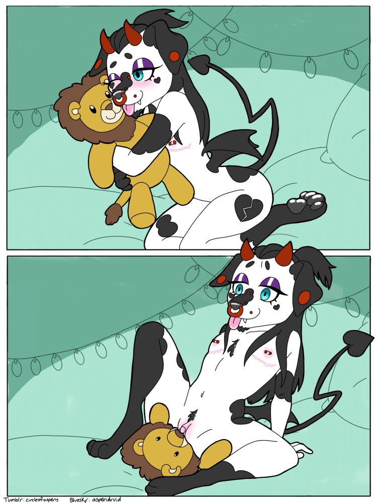 an erotic two panel color comic portraying a transmasculine demonic dalmatian furry and a lion plush on a soft looking bed and string lights in the monochromatic green background. In the first panel, he is holding the lion plush close with his tongue against its snout for a kiss. In the second panel, he is sitting on the lion's face. The demon had bat-like wings on his waist, long black hair, and many various red piercings and top surgery scars.