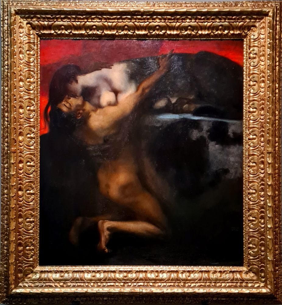 The Kiss of the Sphinx (1895), a painting by Franz von Stuck. The painting is a symbolist work depicting the passionate embrace and kiss between a woman with a lion's body (with her upper body bare) and a man. The artwork portrays the sphinx as a femme fatale character, and the act itself explores the intersection of desire, lust, and death.