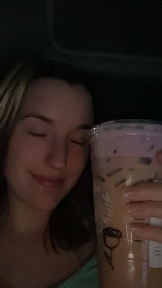 girl holding coffee 