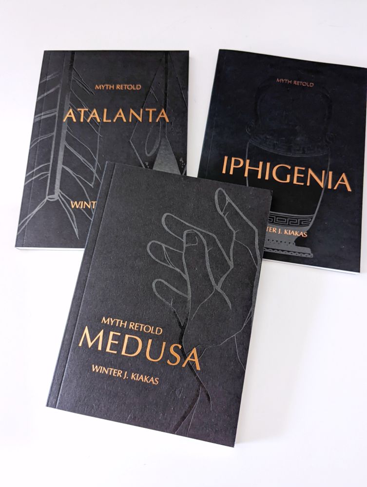 Photo of the 3 books in the Myth Retold series: Atalanta, Iphigenia and Medusa.