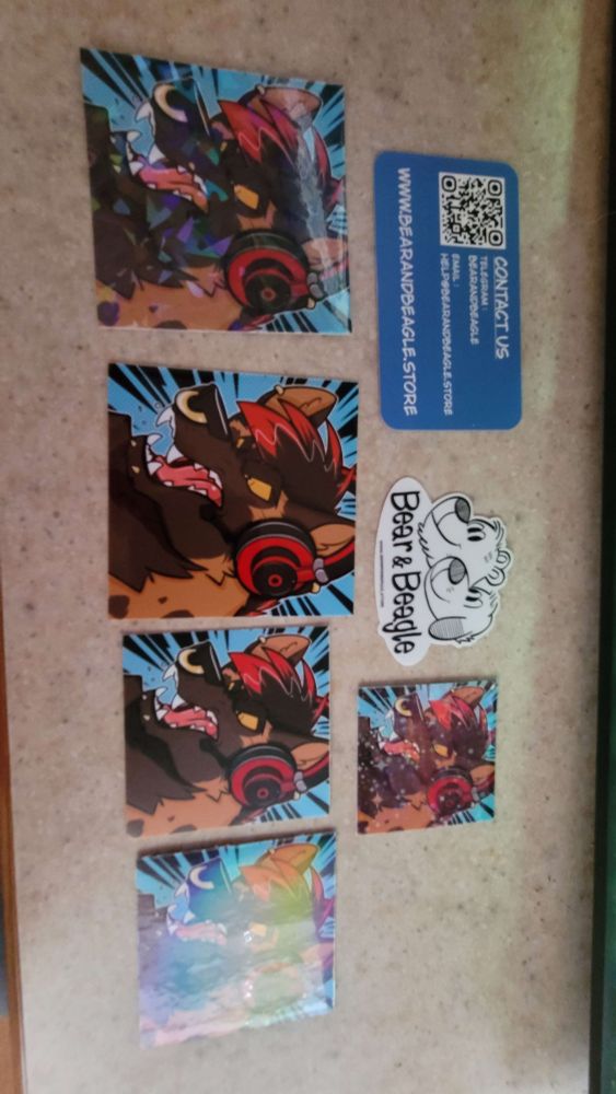 Different sizes and finishes of furry icon by Bear and Beagle sticker store 
