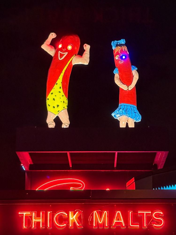 The giant hot dogs atop Superdawg