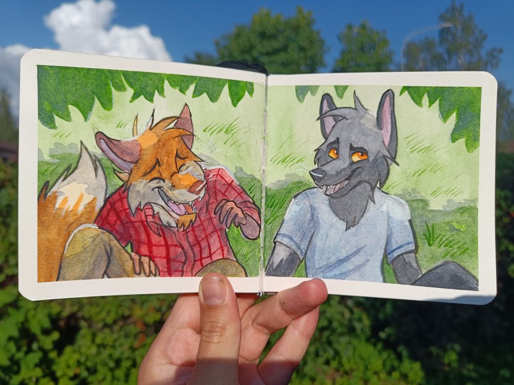 A watercolor painting of two anthropomorphic foxes. Red fox on the left, silver Fox on the right. They are sitting in the shade of a tree on the grass.