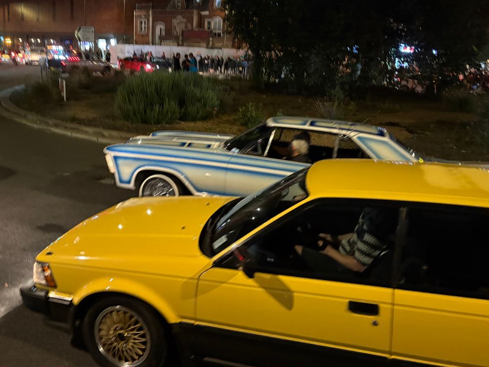 Two cool American style cars and I know no more. Hot rod style maybe? Yellow car. 