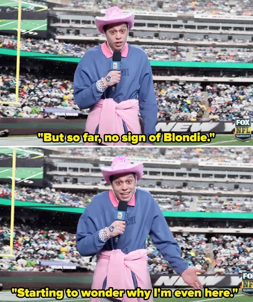 Pete Davidson on an NFL field wearing a pink cowboy hat, a blue Taylor Swift Eras Tour crewneck, 13 on his hand, friendship bracelets, and a pink sweatshirt tied around his waist