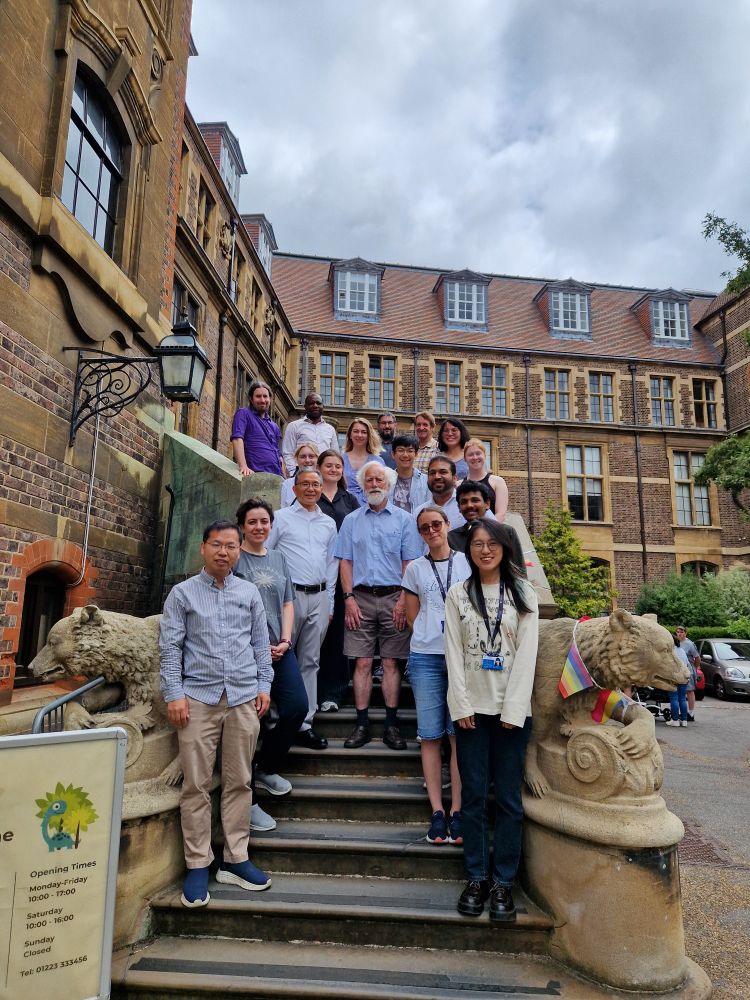 Participants of the short course stood on the Sedgwick Museum stairs.