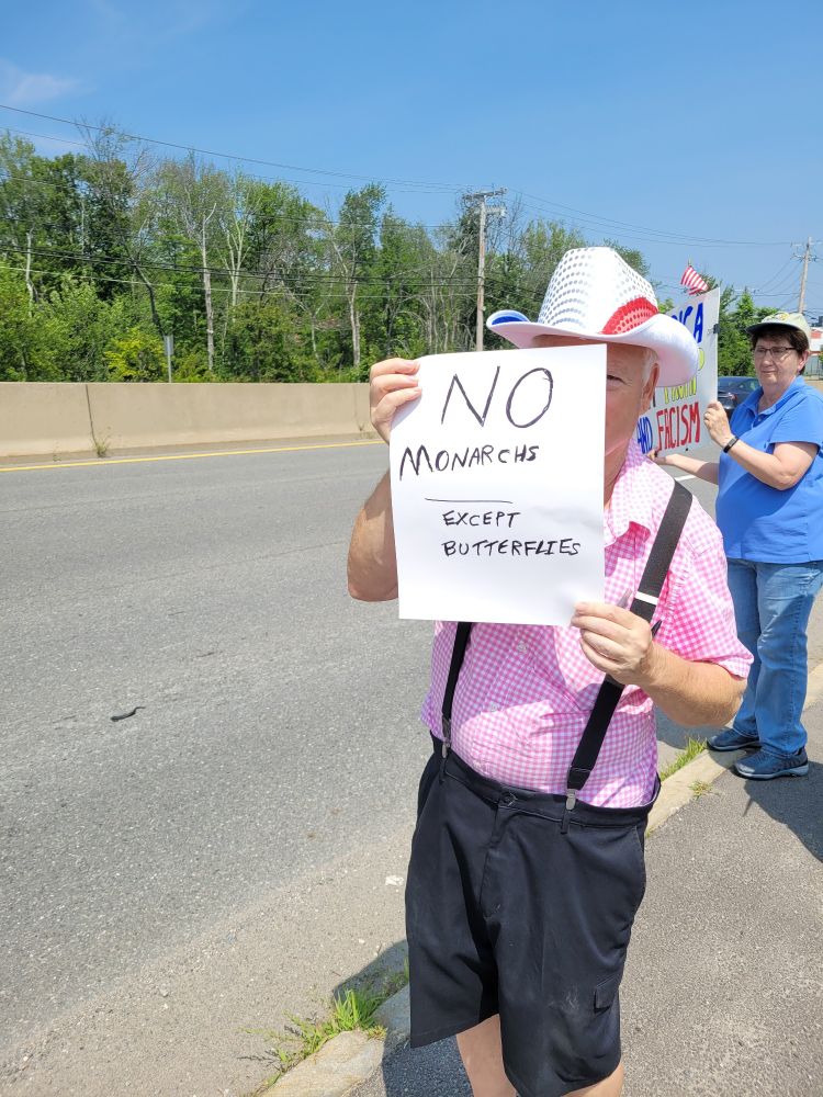 Sign : No Monarchs (except butterflies)