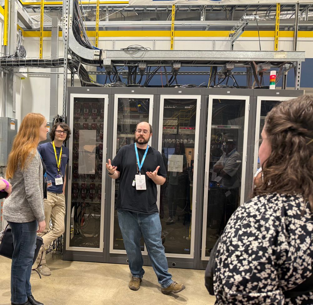 Scientists touring a beam line