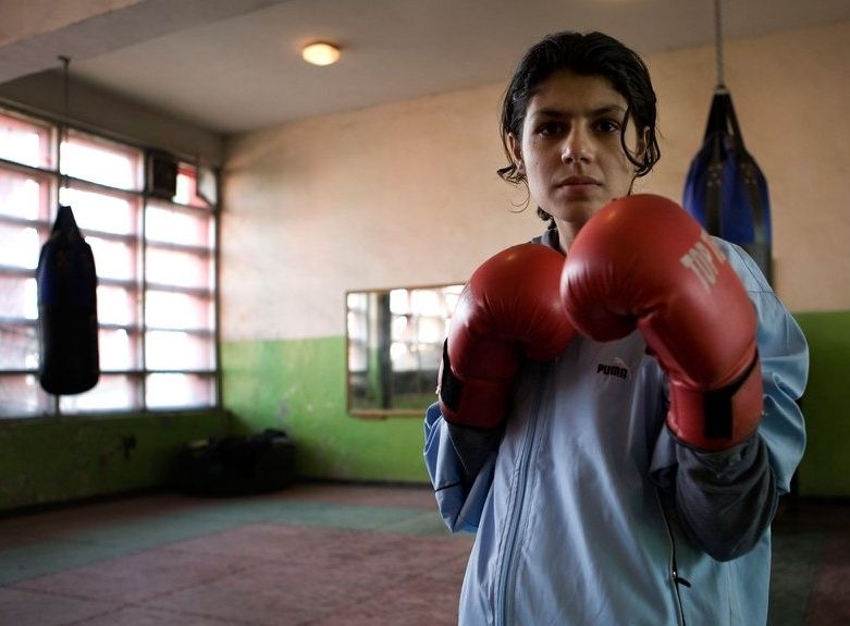 Photo of a female boxer in a Kabul gym