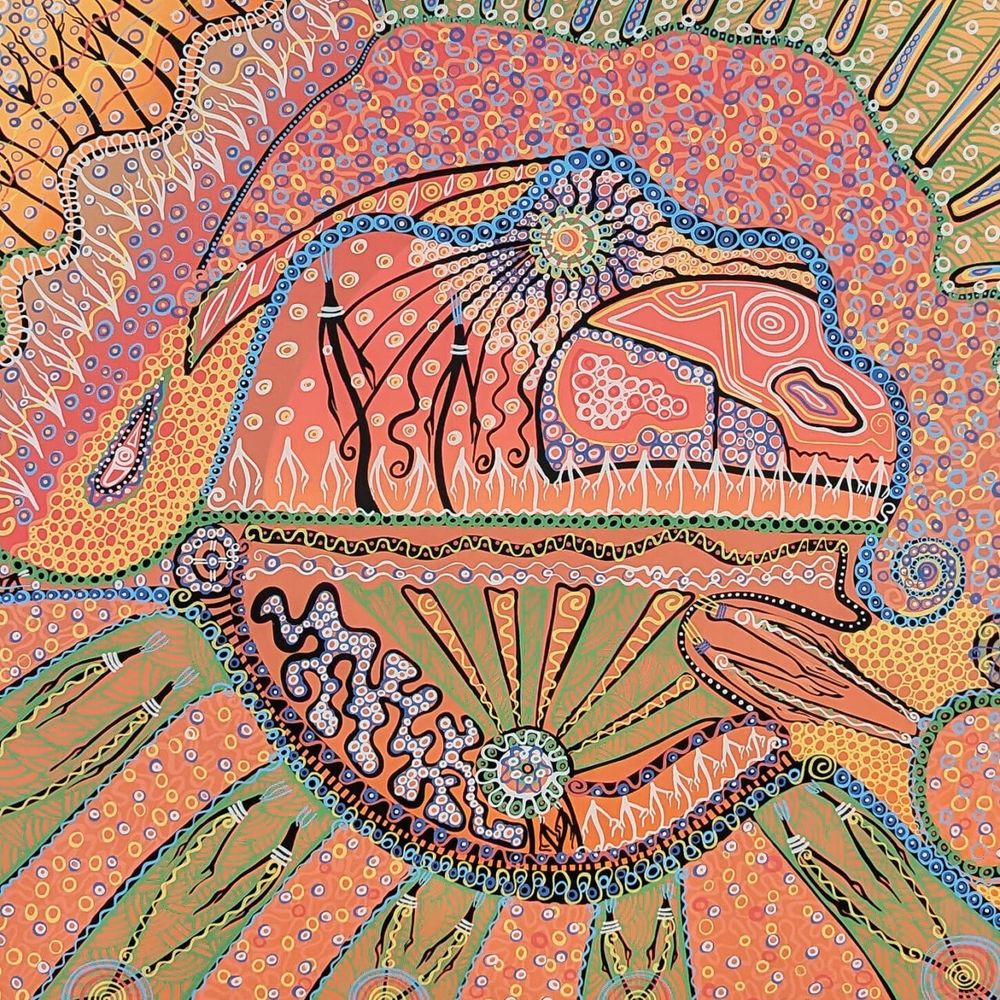 Print in multicolours with significant symbols and motifs
