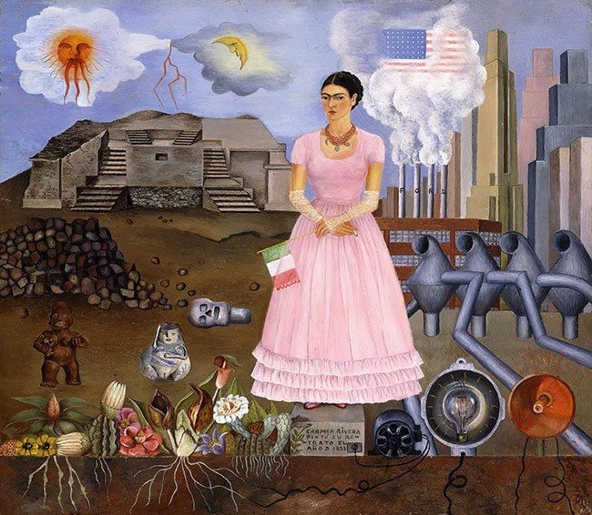 Surrealist type painting with a central standing female figure in a long pink dress holding a Mexican flag with buildings and machinery behind her to the right and ancient Mexican artifacts and iconography to her left