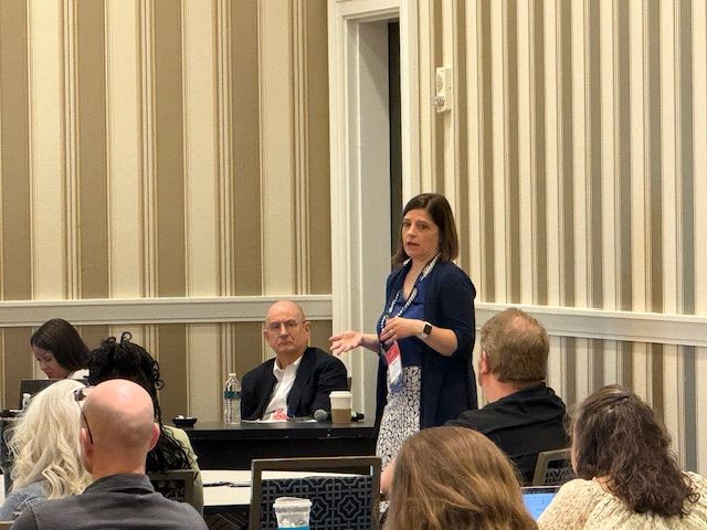CHDI's Aleece Kelly speaking to Institute participants