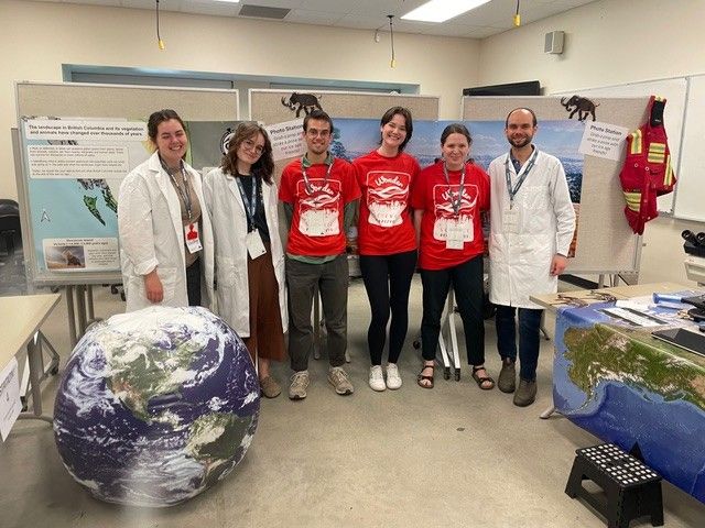 Professor Sophie Norris's students explaining the Kid Zone activities. 