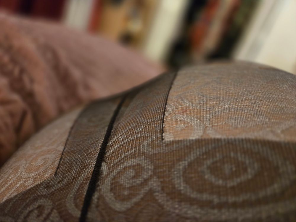 Another closeup of Mona in semi-opaque black nylon tights layered over light gray lace panties. 