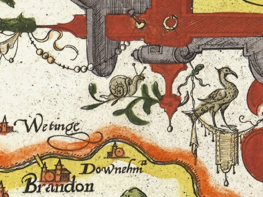 Detail from a hand-painted, sixteenth-century map. It is focusing on a decorative part of the map, below framed text containing information about the map (not visible in this image). At the bottom edge of the frame is a leafy stalk upon which sits a very tiny snail. There is a small section of land along the coast at the bottom of the image, which includes the town Brandon in Suffolk. 