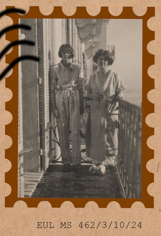 Cropped image from an exhibition board showing a black and white photograph of Daphne and her sister Angela du Maurier standing on the far end of a balcony. The photograph has been designed to look like a stamp, as part of a exhibition board for the PenPals exhibition. Typed under the photograph is the reference number: EUL MS 462/3/10/24.