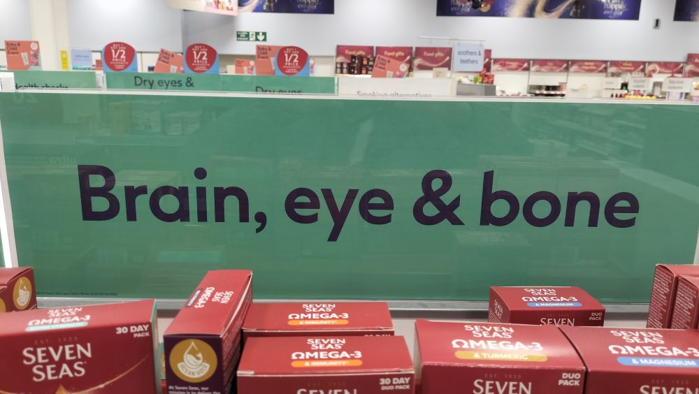 Brain, eye & bone. Sign in a pharmacy.